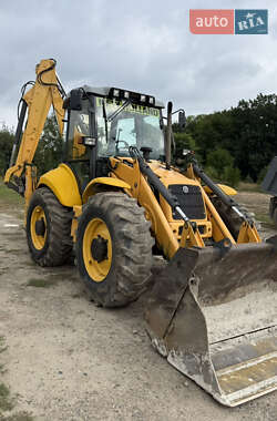 Экскаватор погрузчик New Holland LB115 4PS 2007 в 