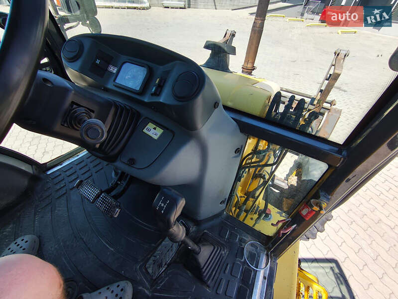 Екскаватор навантажувач New Holland LB95B-4PT 2003 в Львові