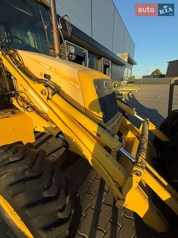Екскаватор навантажувач New Holland LB95B-4PT 2003 в Львові