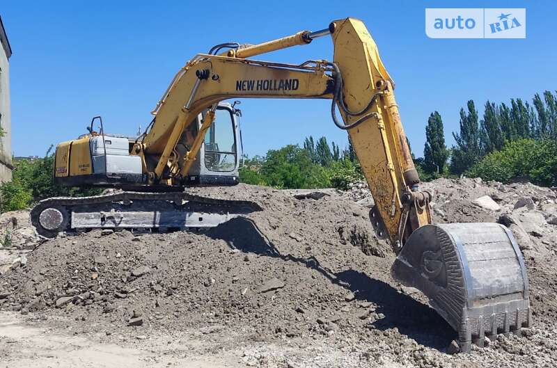Гусеничный экскаватор New Holland LB 2007 в 