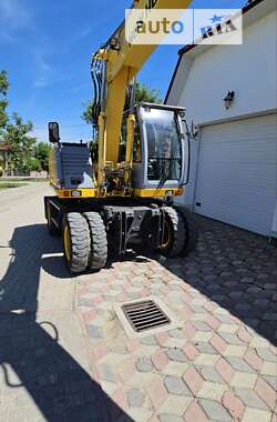 Колесный экскаватор New Holland MH 3.6 2009 в 