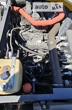 Колесный экскаватор New Holland MH 3.6 2009 в 