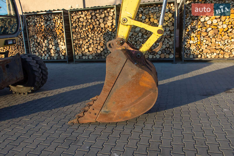 Колесный экскаватор New Holland MH 3.6 2003 в Житомире фото 5 Колесный экскаватор New Holland MH 3.6 2003 в Житомире