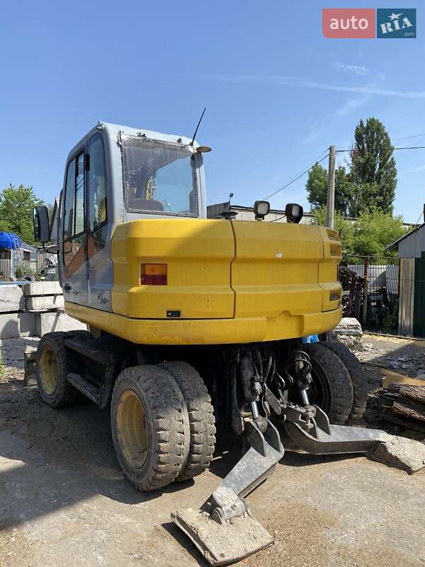 Екскаватор навантажувач New Holland MH 3.6 2007 в 