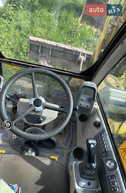 Екскаватор навантажувач New Holland MH 3.6 2007 в 