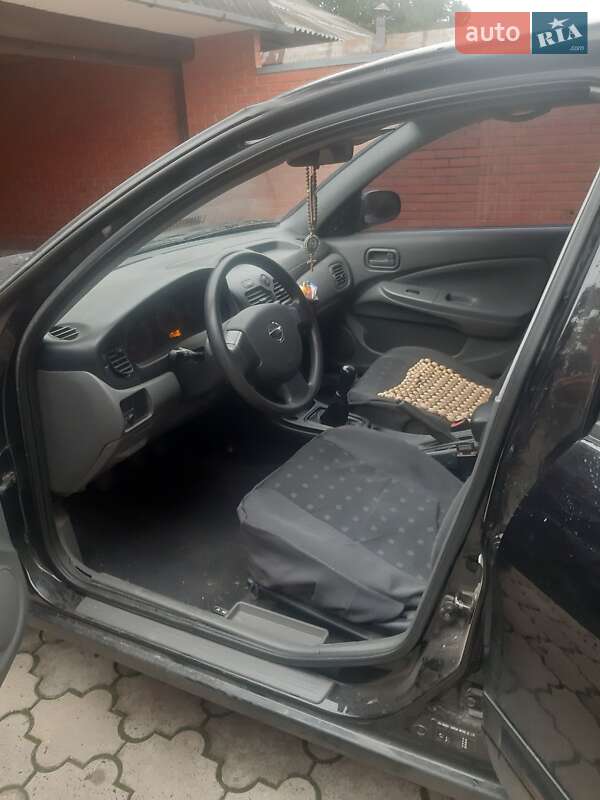 Седан Nissan Almera Classic 2010 в Охтирці