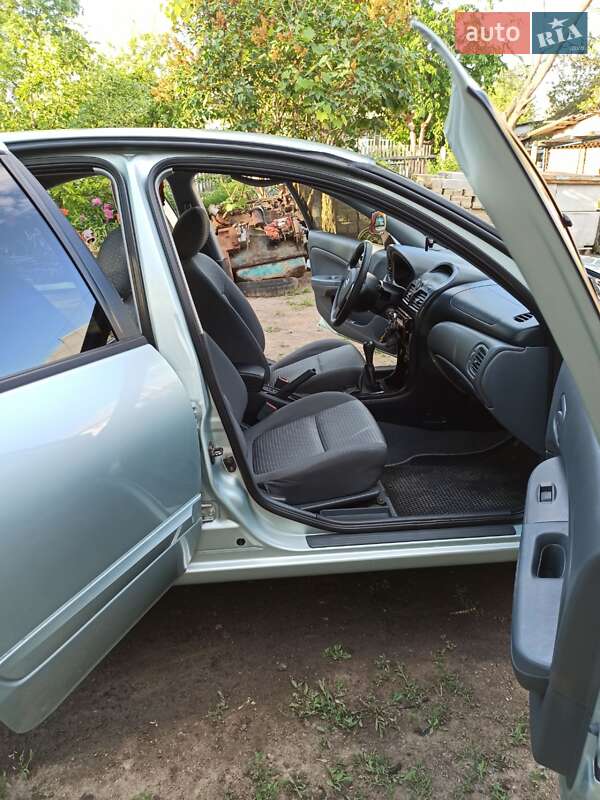 Седан Nissan Almera 2010 в Гайсину