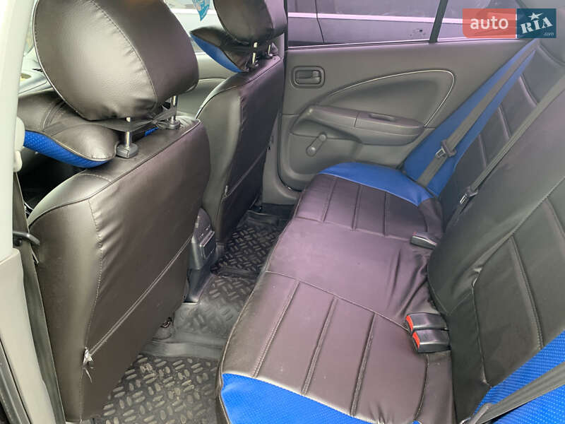 Седан Nissan Almera 2012 в Буче