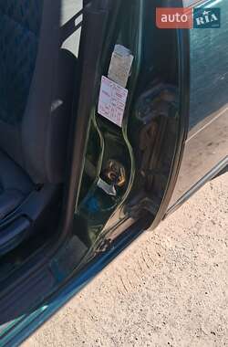 Хэтчбек Nissan Almera 1997 в 