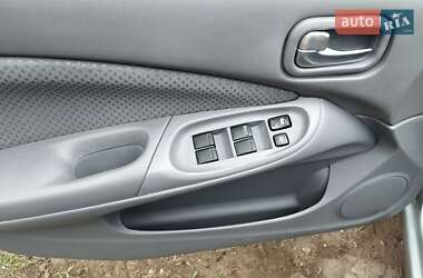 Хэтчбек Nissan Almera 2003 в 