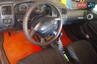 Хэтчбек Nissan Almera 1996 в 