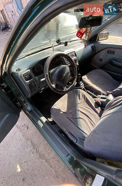 Хетчбек Nissan Almera 1995 в 