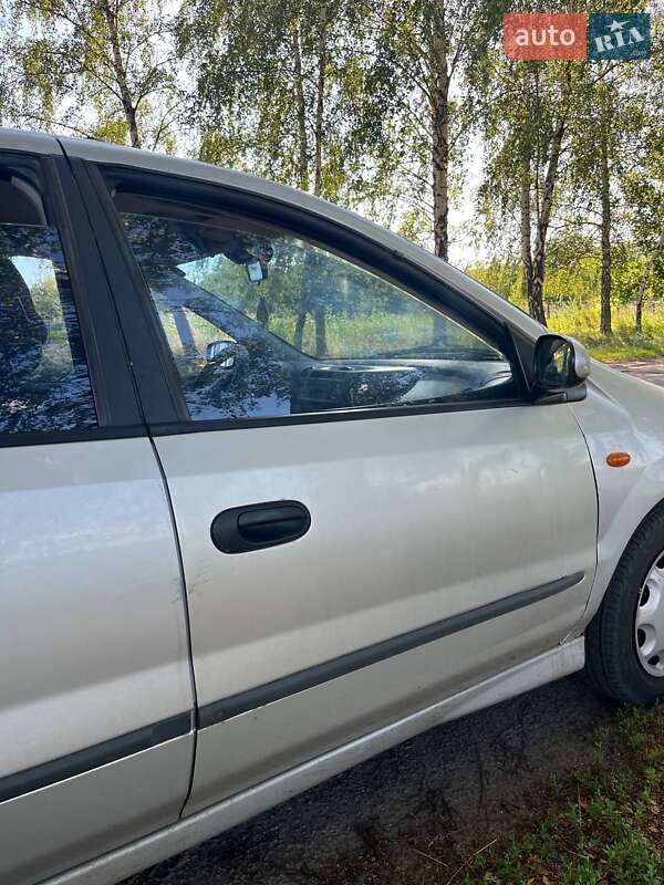 Хэтчбек Nissan Almera 2001 в Краснограде фото 10 Хэтчбек Nissan Almera 2001 в Краснограде