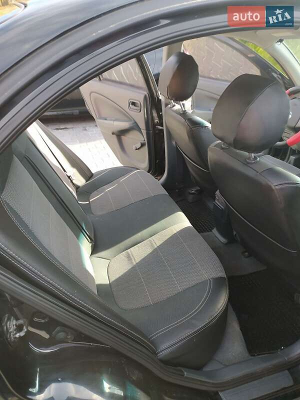 Седан Nissan Almera 2007 в Комарному