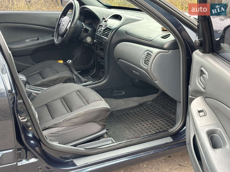 Седан Nissan Almera 2006 в Мене