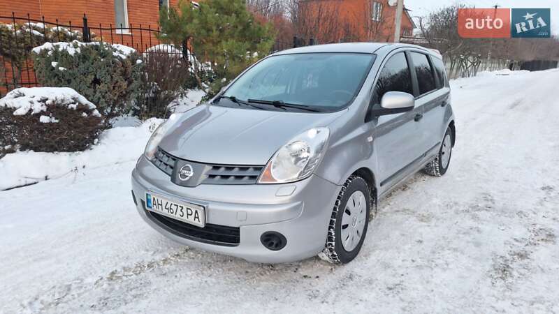 2008 Nissan Note, VIN SJNFAAE11U1277229:plate — фото 1 (autoria)