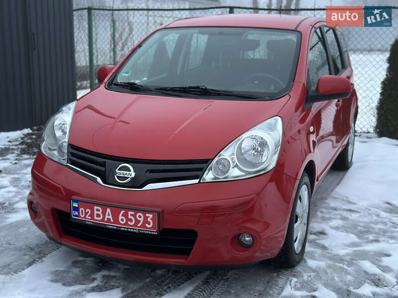2010 Nissan Note, VIN SJNFAAE11U2083059:plate — фото 1 (autoria)