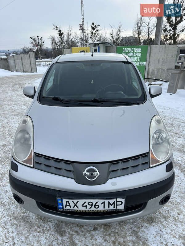 2007 Nissan Note, VIN SJNFAAE11U1153722:plate — фото 1 (autoria)