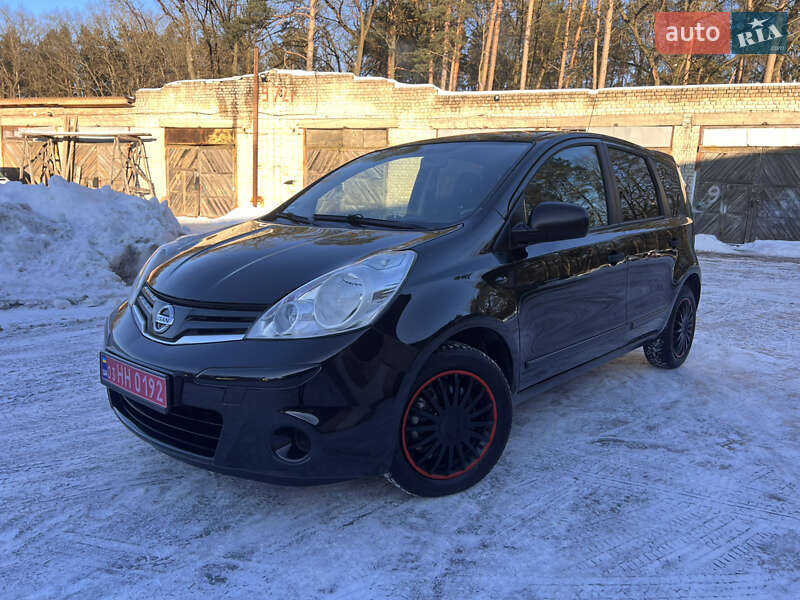 2010 Nissan Note, VIN SJNFAAE11U2083619:plate — фото 1 (autoria)
