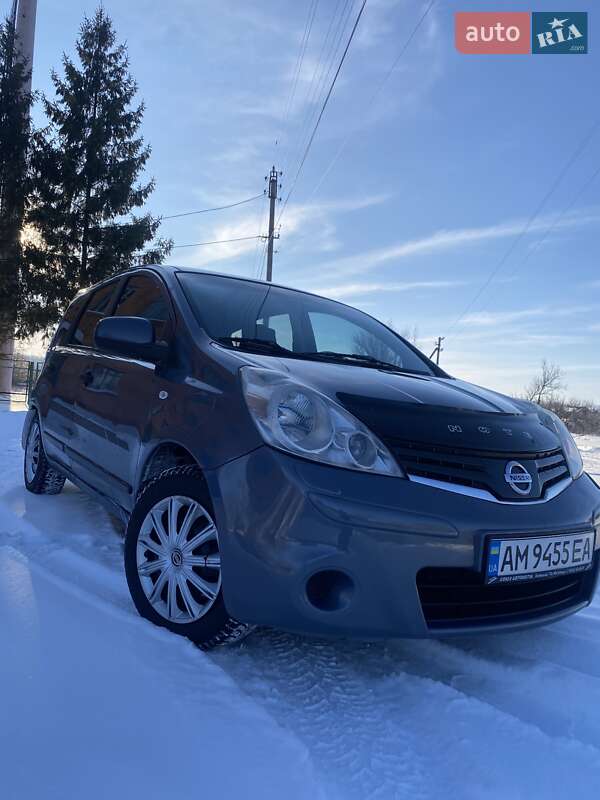 2011 Nissan Note, VIN SJNFCAE11U2110761:plate — фото 1 (autoria)