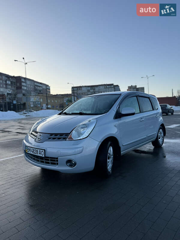2008 Nissan Note, VIN SJNFCAE11U1290590:plate — фото 1 (autoria)