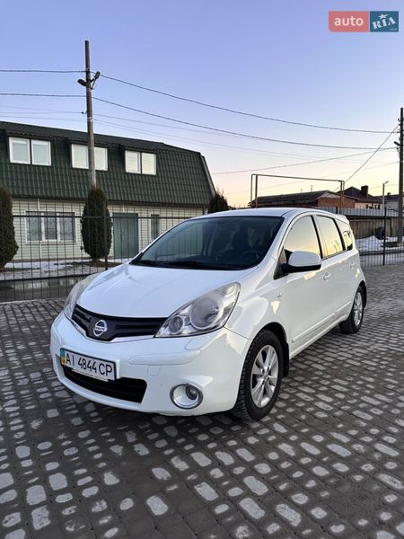 2012 Nissan Note, VIN SJNFCAE11U2177435:plate — фото 1 (autoria)