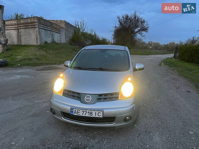 2008 Nissan Note, VIN SJNFCAE11U1269606:plate — фото 1 (autoria)