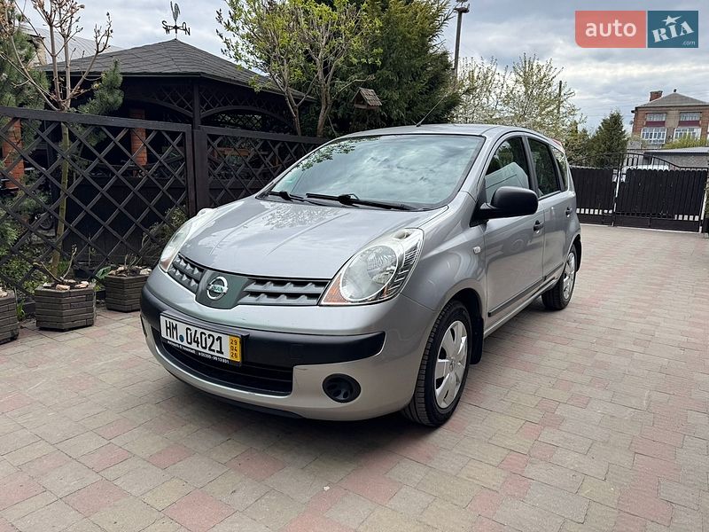 2007 Nissan Note, VIN SJNFAAE11U1112820:plate — фото 1 (autoria)