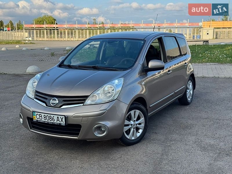 2012 Nissan Note, VIN SJNFAAE11U2167764:plate — фото 1 (autoria)