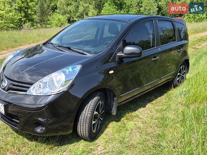 2013 Nissan Note, VIN SJNFAAE11U2211171:plate — фото 1 (autoria)