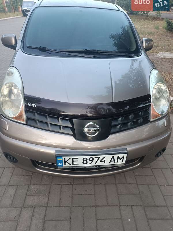 2008 Nissan Note, VIN SJNFAAE11U1286044:plate — фото 1 (autoria)