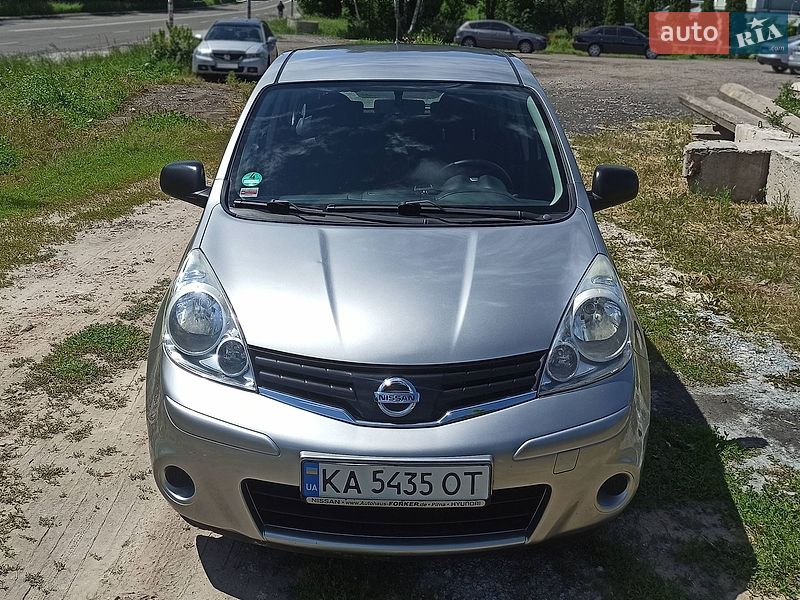 2009 Nissan Note, VIN SJNFAAE11U2042658:plate — фото 1 (autoria)