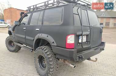 Внедорожник / Кроссовер Nissan Patrol 2004 в 