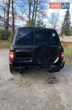 Внедорожник / Кроссовер Nissan Patrol 2003 в  фото 4 Внедорожник / Кроссовер Nissan Patrol 2003 в