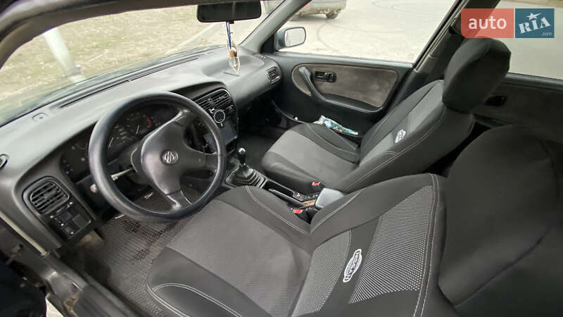 Седан Nissan Primera 1994 в Новомосковске фото 7 Седан Nissan Primera 1994 в Новомосковске