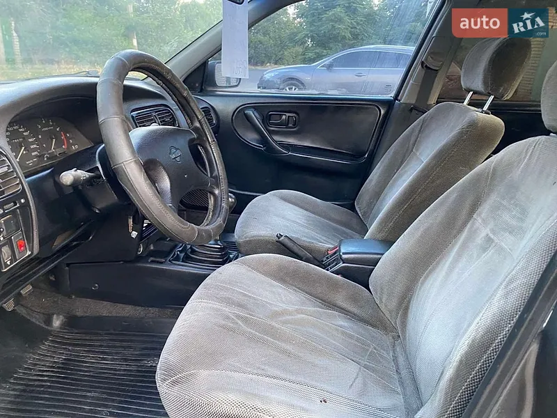 Nissan Primera 1992 VIN SJNFCAP10U0305098 фото оголошення 2 з 36
