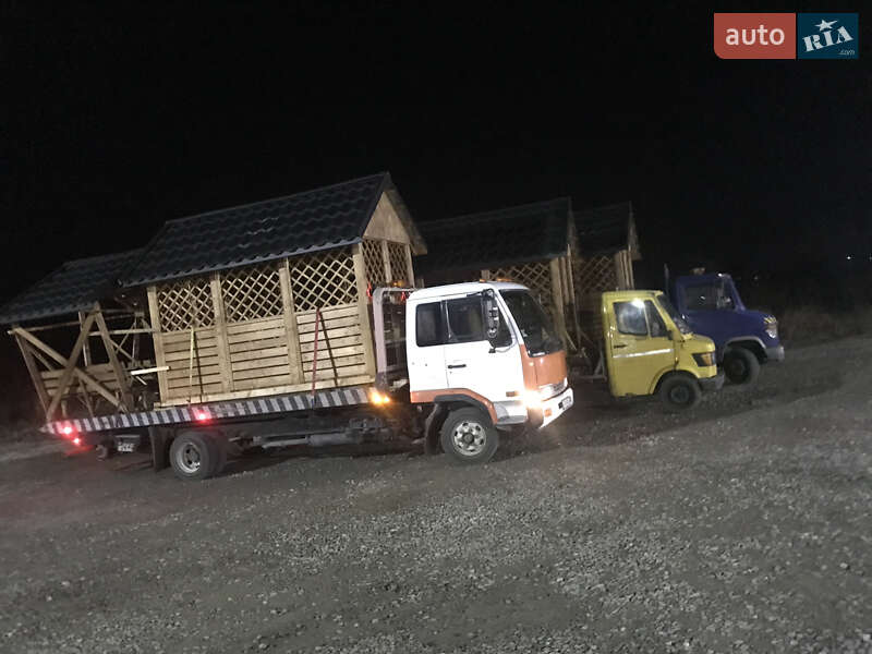 Автовоз Nissan UD 2005 в Коломиї