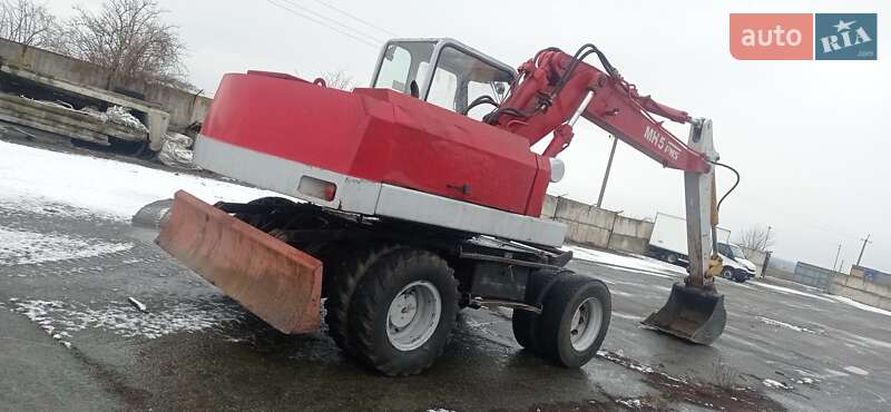 Екскаватор навантажувач O&K MH 5 1993 в Чинадієвому