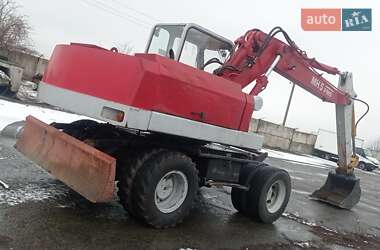 Екскаватор навантажувач O&K MH 5 1993 в 