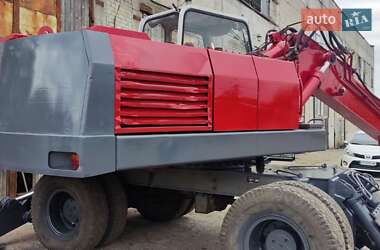 Колесный экскаватор O&K MH 1993 в 