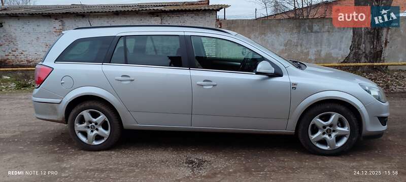 2010 Opel Astra, VIN W0L0AHL35A2081425:plate — фото 1 (autoria)