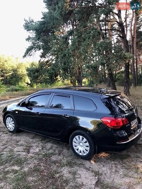 2014 Opel Astra - мініатюра 7