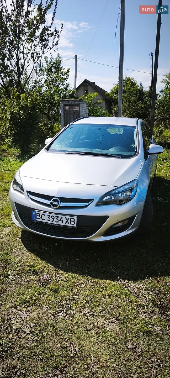 2014 Opel Astra - фото 1