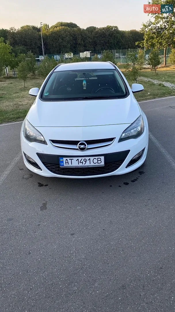 2013 Opel Astra - фото 1