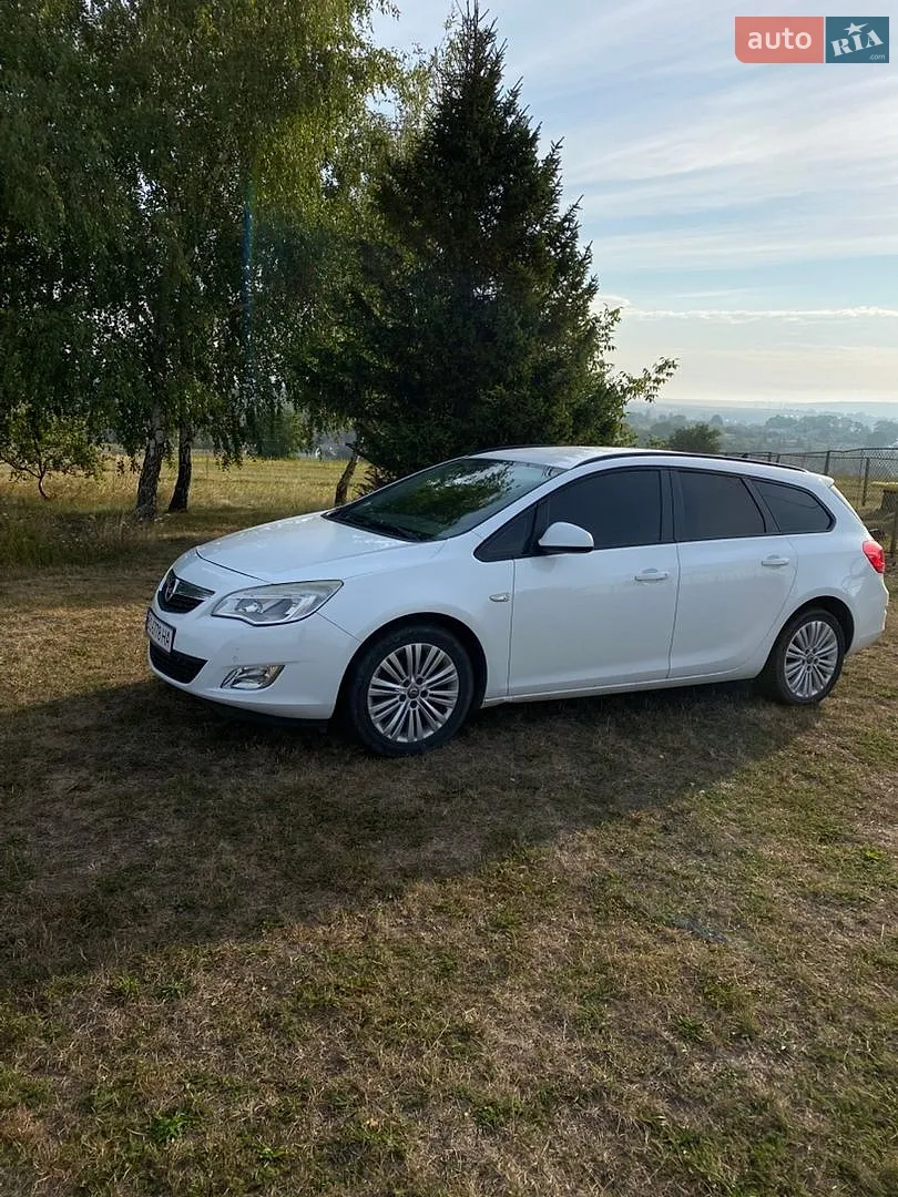 2011 Opel Astra - фото 1