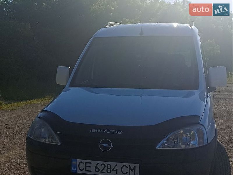 2011 Opel Combo, VIN W0LVXCF25B4321216:plate — фото 1 (autoria)