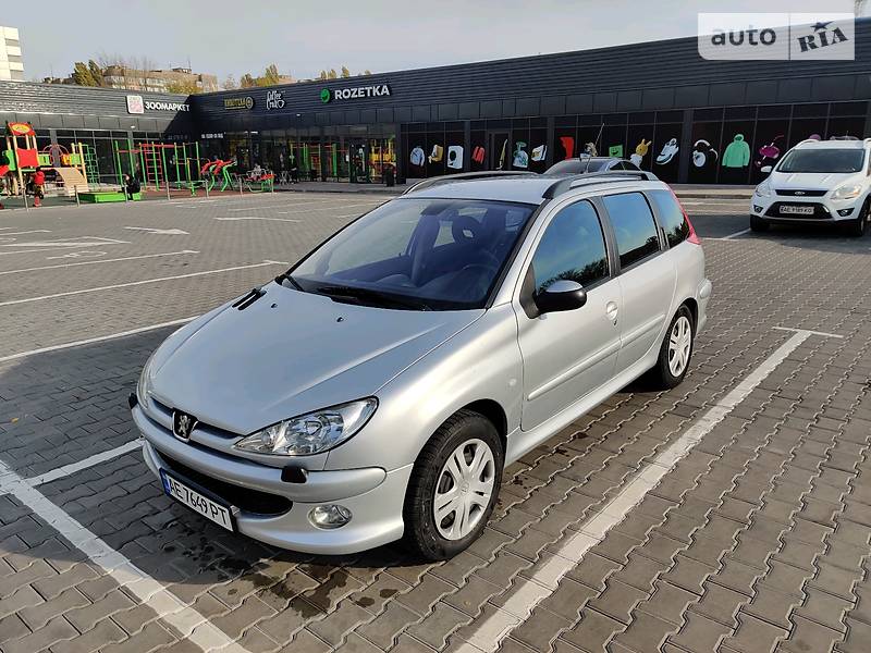 Какое время разгона до 100 км./ч у Peugeot 206?