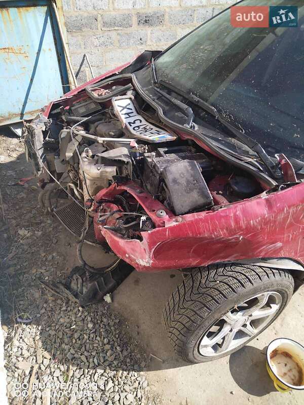 Хетчбек Peugeot 206 2004 в 
