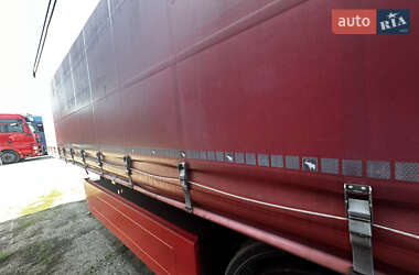 Тентований борт (штора) - напівпричіп Schmitz Cargobull Cargobull 2013 в 