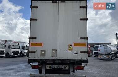 Бортовий напівпричіп Schmitz Cargobull S01 2004 в 
